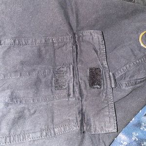 Black mini skirt with pockets